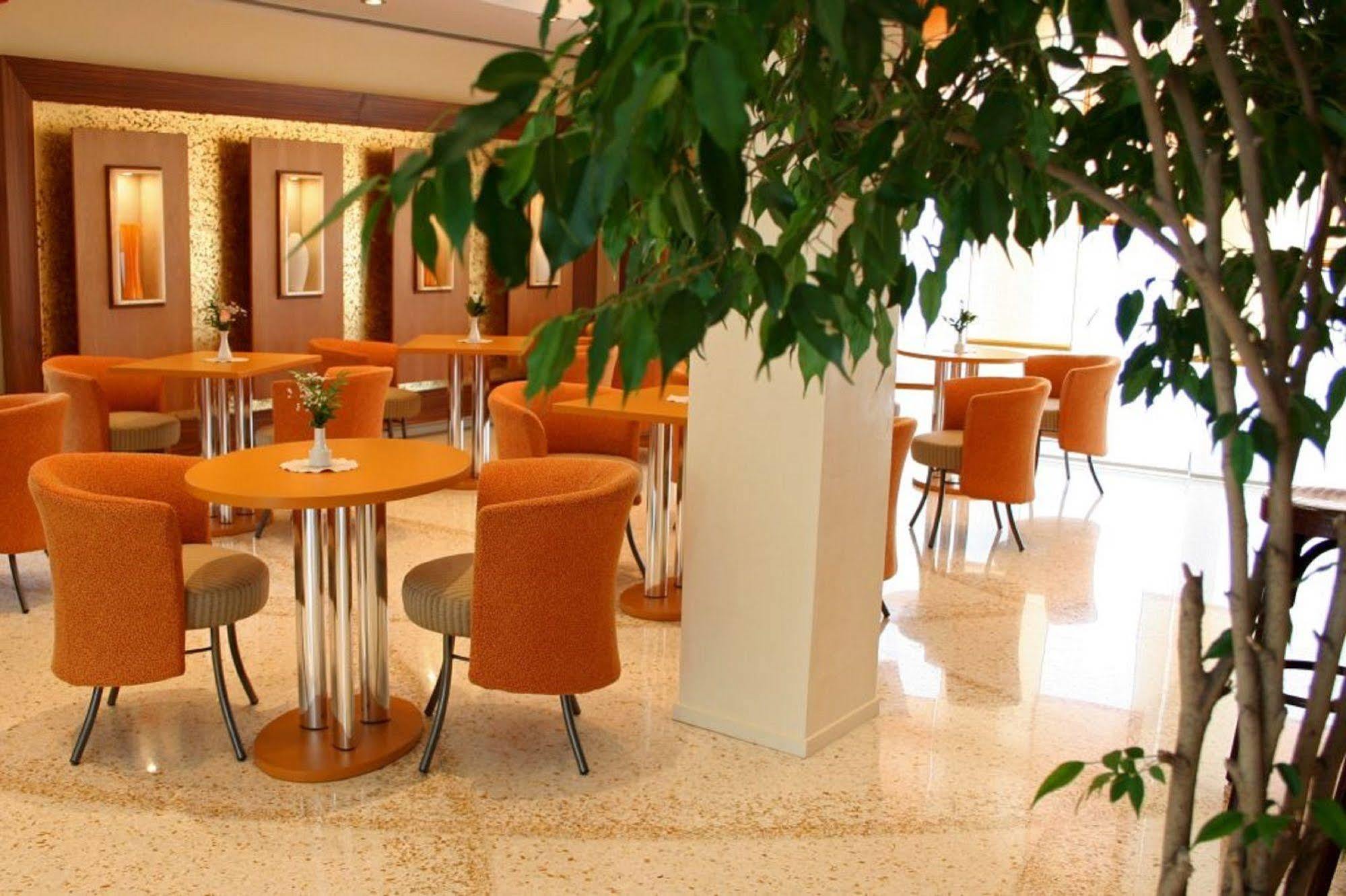 Poli Hotel Сан-Витторе-Олона Ресторан фото